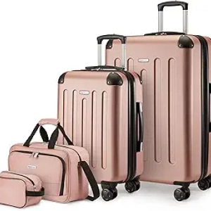 Amazon Basics 4-Piece Rose Gold Luggage Set with Spinner Wheels | Carry-On & Checked Suitcases